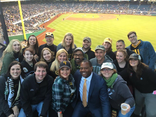 group of people at baseball game
